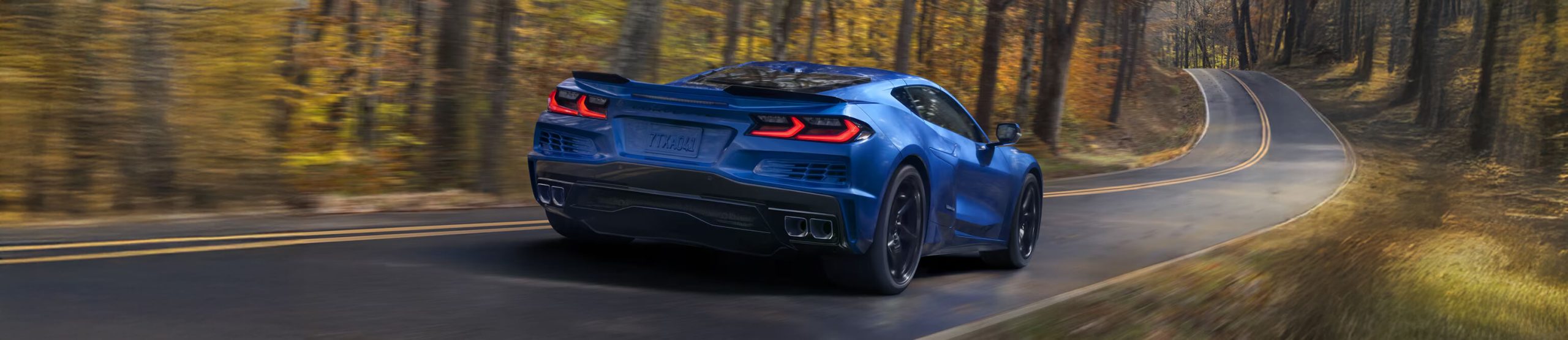 Passenger side view a blue 2025 E-Ray 