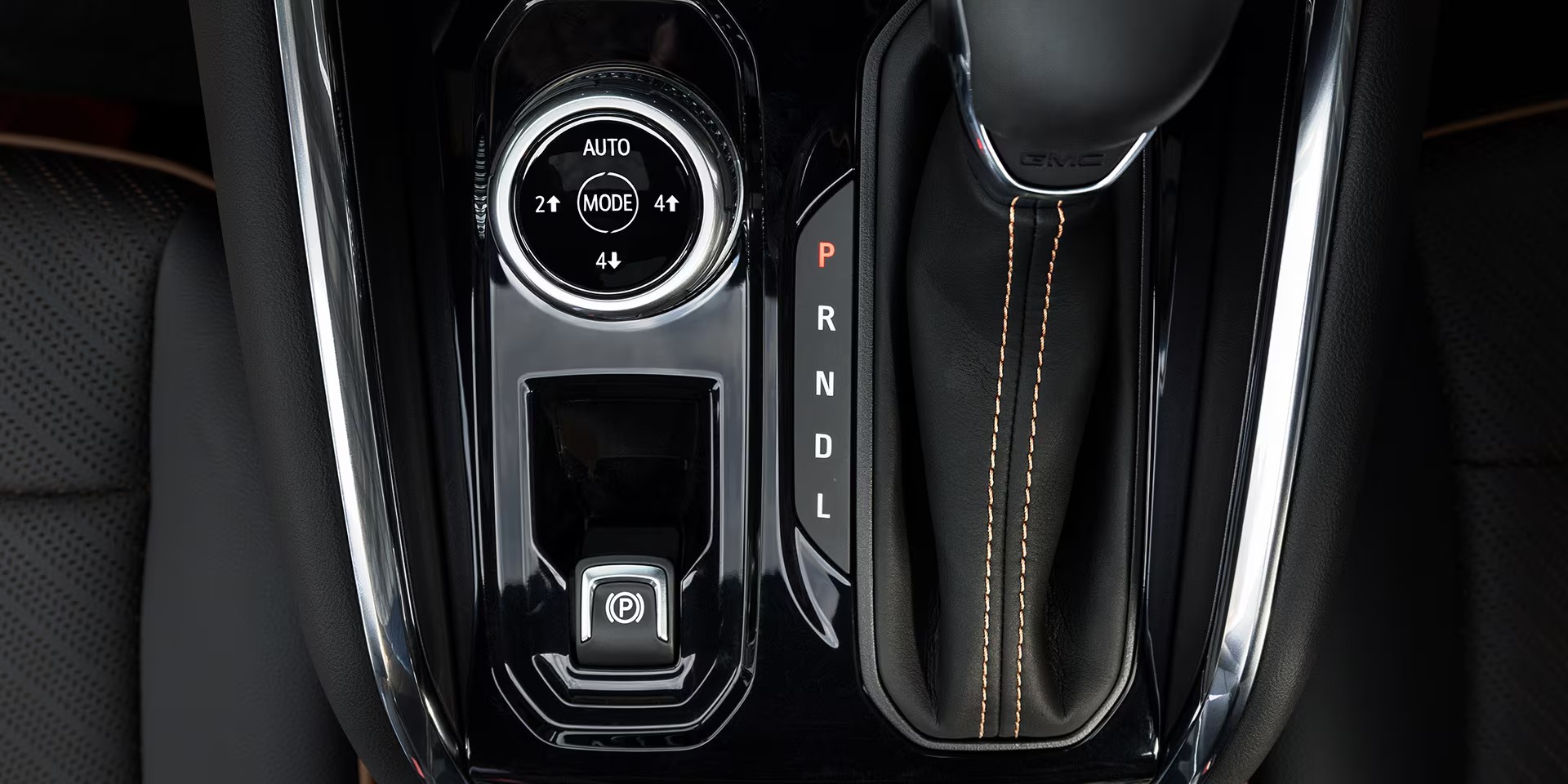 Close-up view of the 2025 GMC Canyon Truck's Selectable Drive Modes Knob and Shifter.