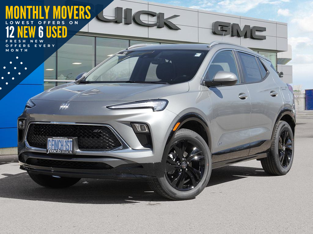 grey 2025 Buick encore GX Sport Touring in front of dealership